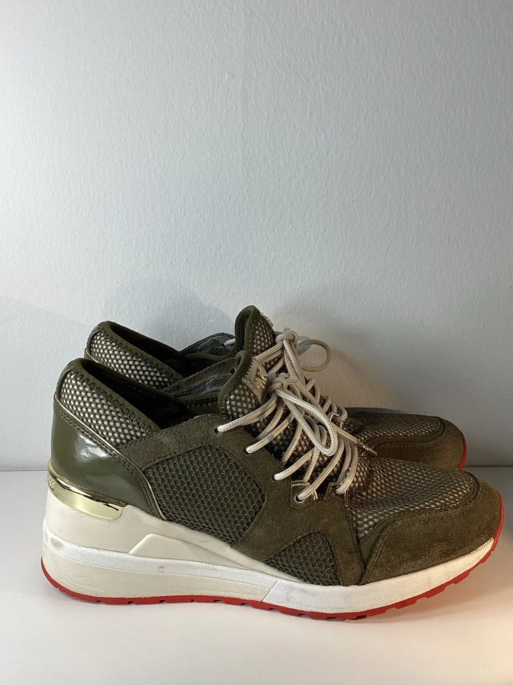 MICHAEL Michael Kors women’s Olive Green Sneakers with Red Soles